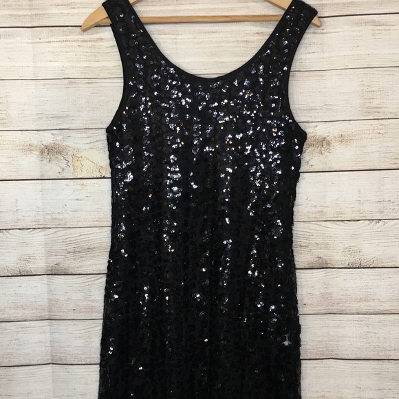 Romeo & Juliet Couture Tops - Romeo & Juliet Couture black sequin tank 😍